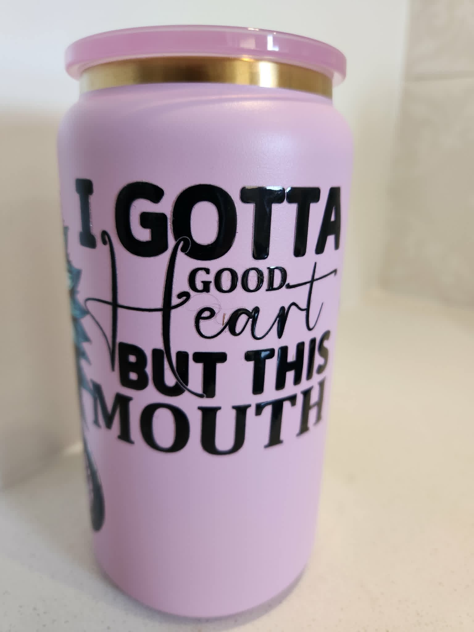 I Gotta Good Heart But This Mouth stainless steel Libby cup - quote side showing I Gotta Good Heart But This Mouth in bold black lettering