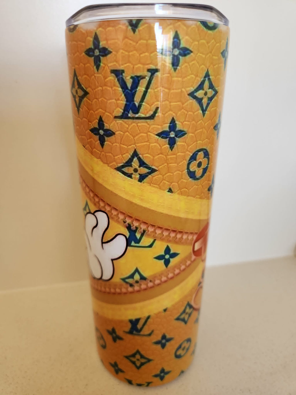 Orange Luxury Monogram Mouse tumbler - side view showing gold monogram pattern