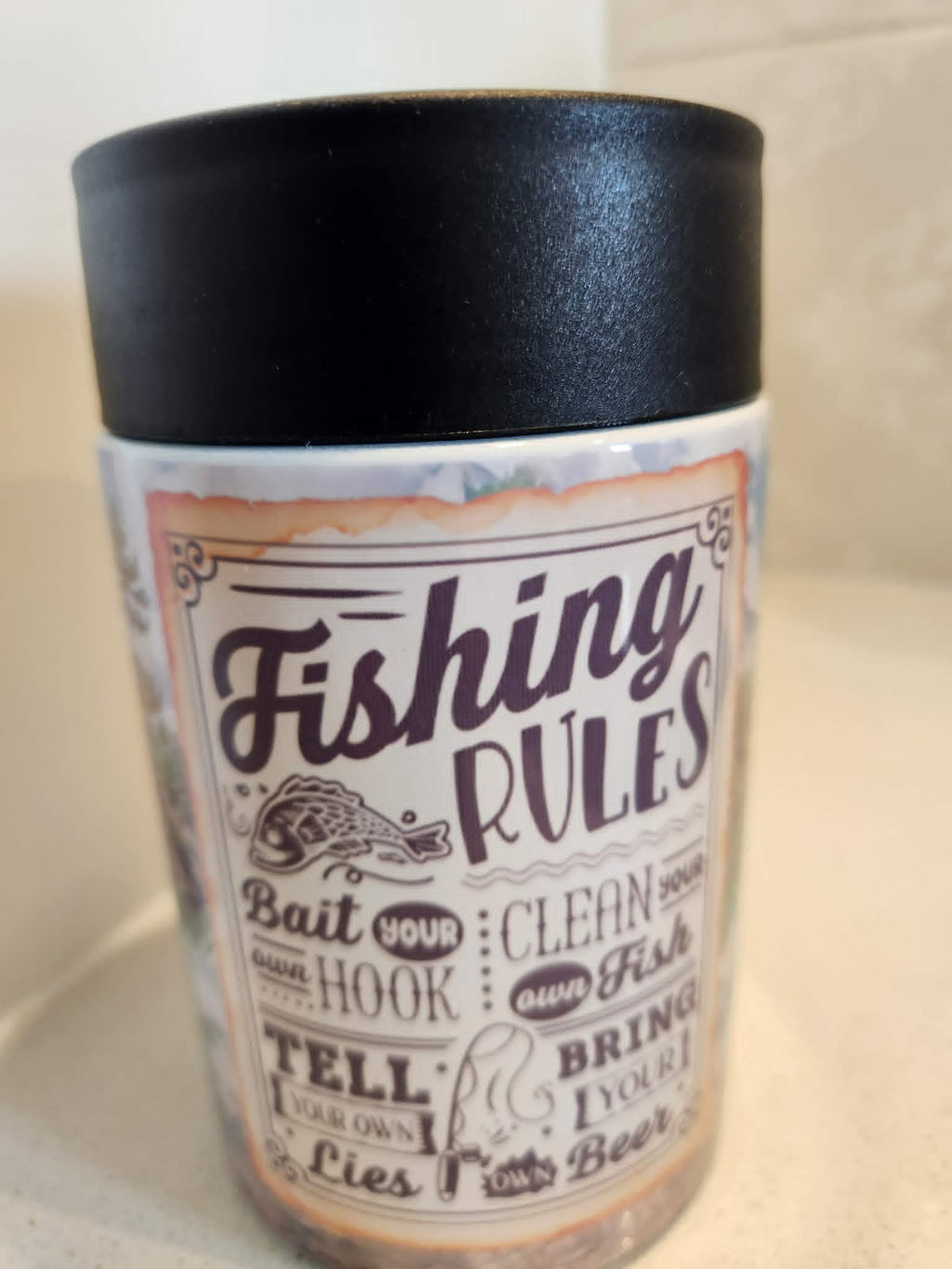 Fishing Rules can cooler - side view showing full vintage label design with fish illustration and decorative border