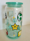 16oz Glass Libby Cup - Super Mario icons including Super Star, Yoshi egg, question block and mushroom with mint lid