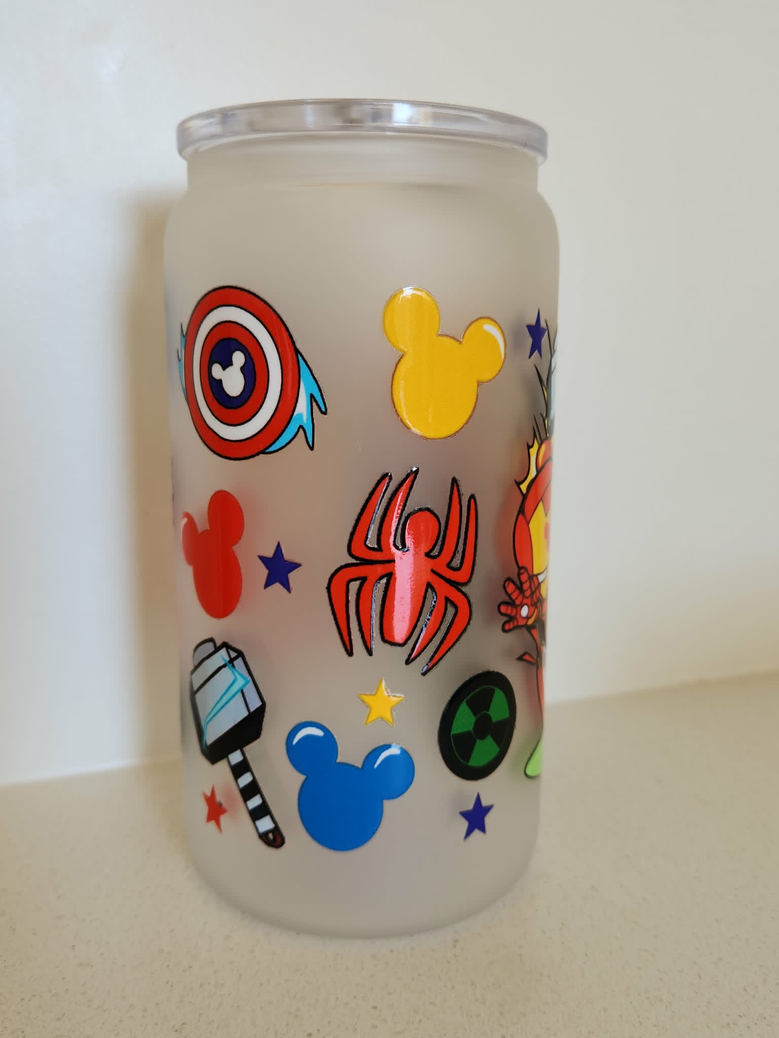 16oz Frosted Glass Libby Cup - Marvel Disney symbols Spider-Man Hulk icons side view