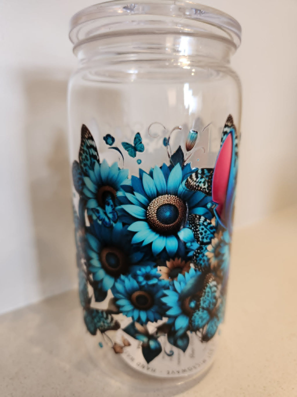 Stitch Blue Sunflower Butterfly acrylic Libby cup - side view showing teal sunflowers and leopard butterflies
