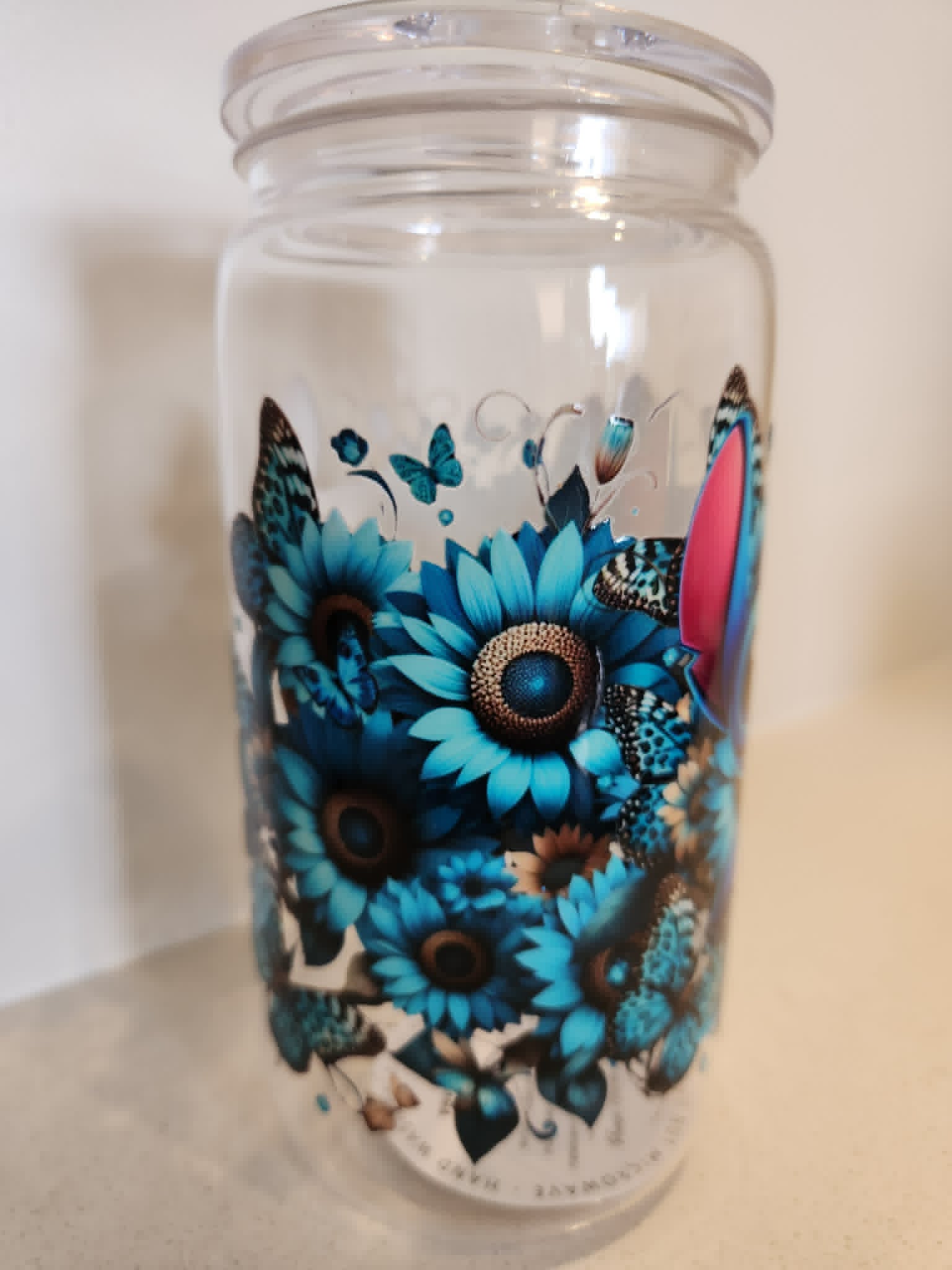 Stitch Blue Sunflower Butterfly acrylic Libby cup - side view showing teal sunflowers and leopard butterflies