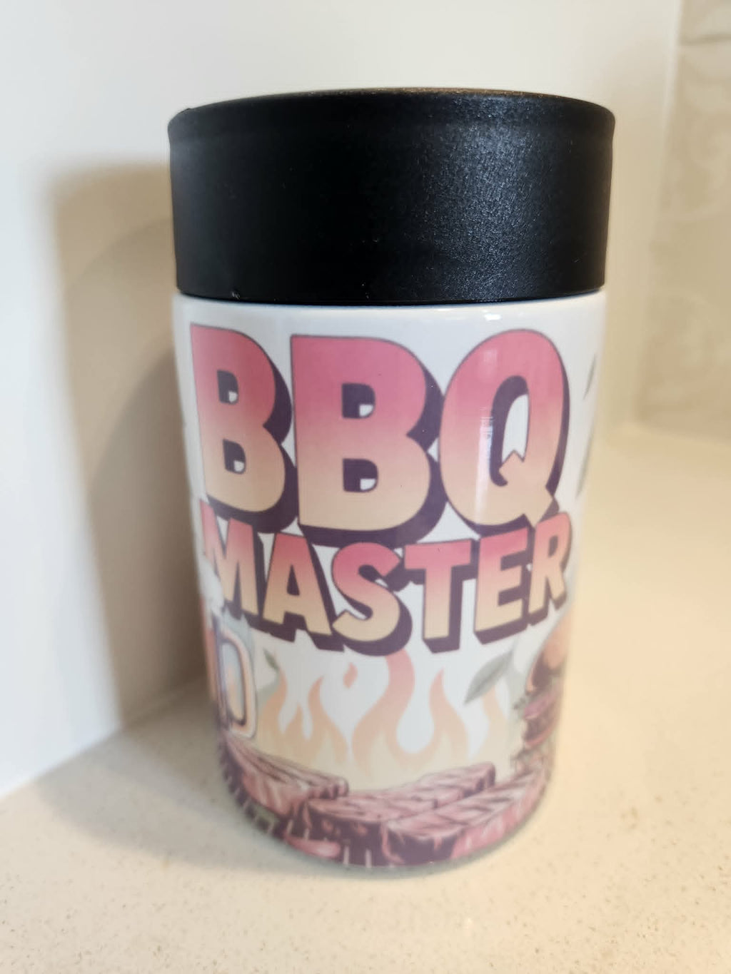 BBQ Master can cooler - front view showing bold pink red BBQ Master lettering with flames and sizzling grill