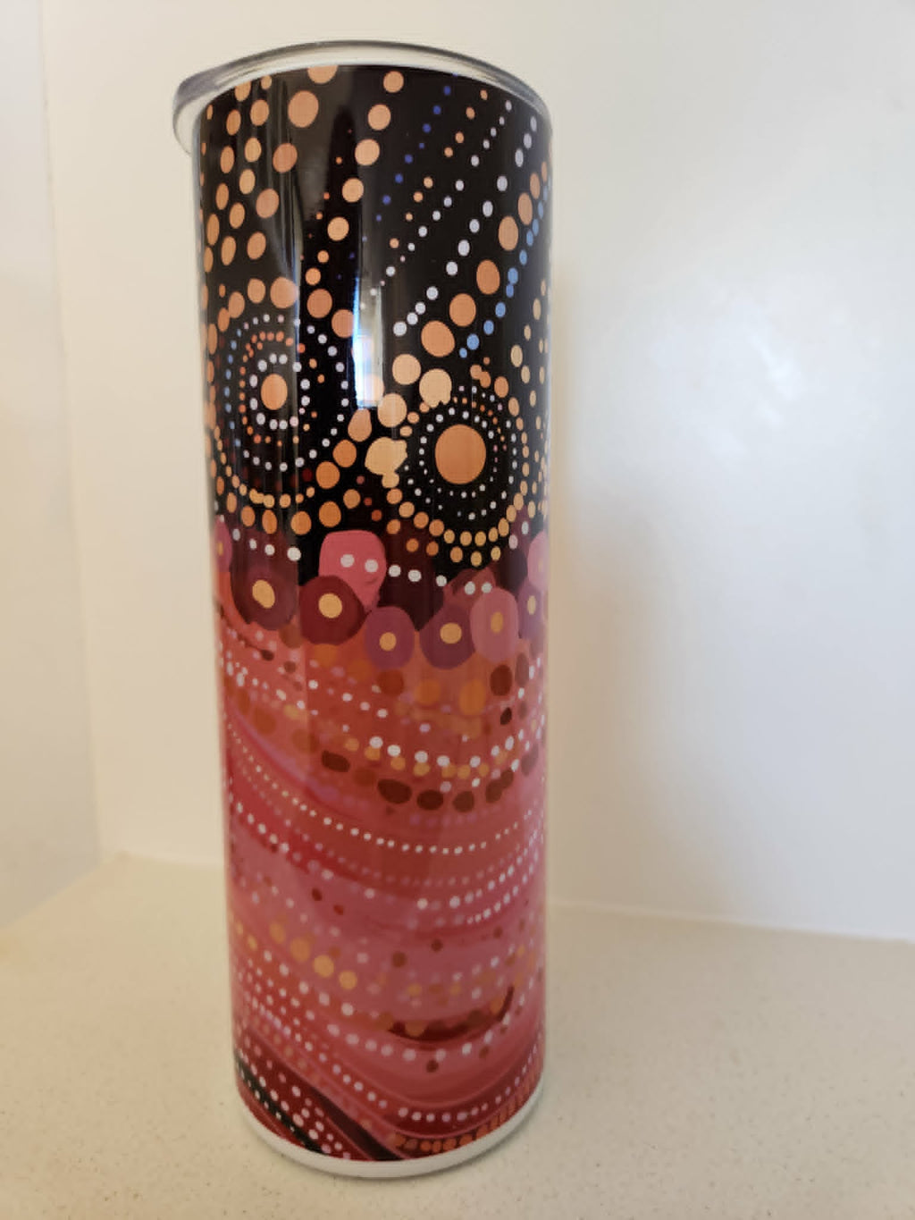 Dreamtime Dots tumbler - front view showing terracotta and gold dot art design