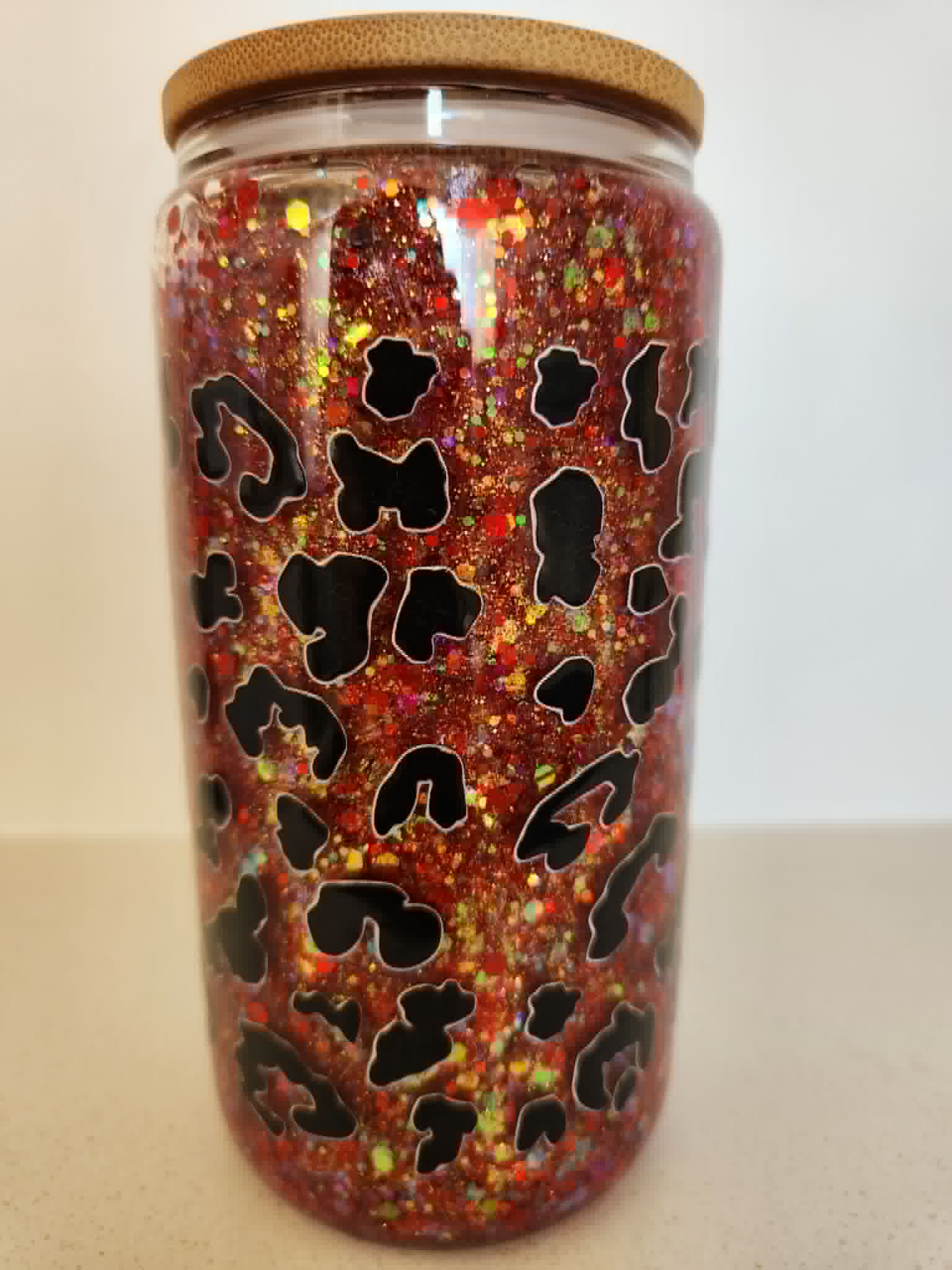 16oz Acrylic Snow Globe - Red glitter leopard print design front view with bamboo lid
