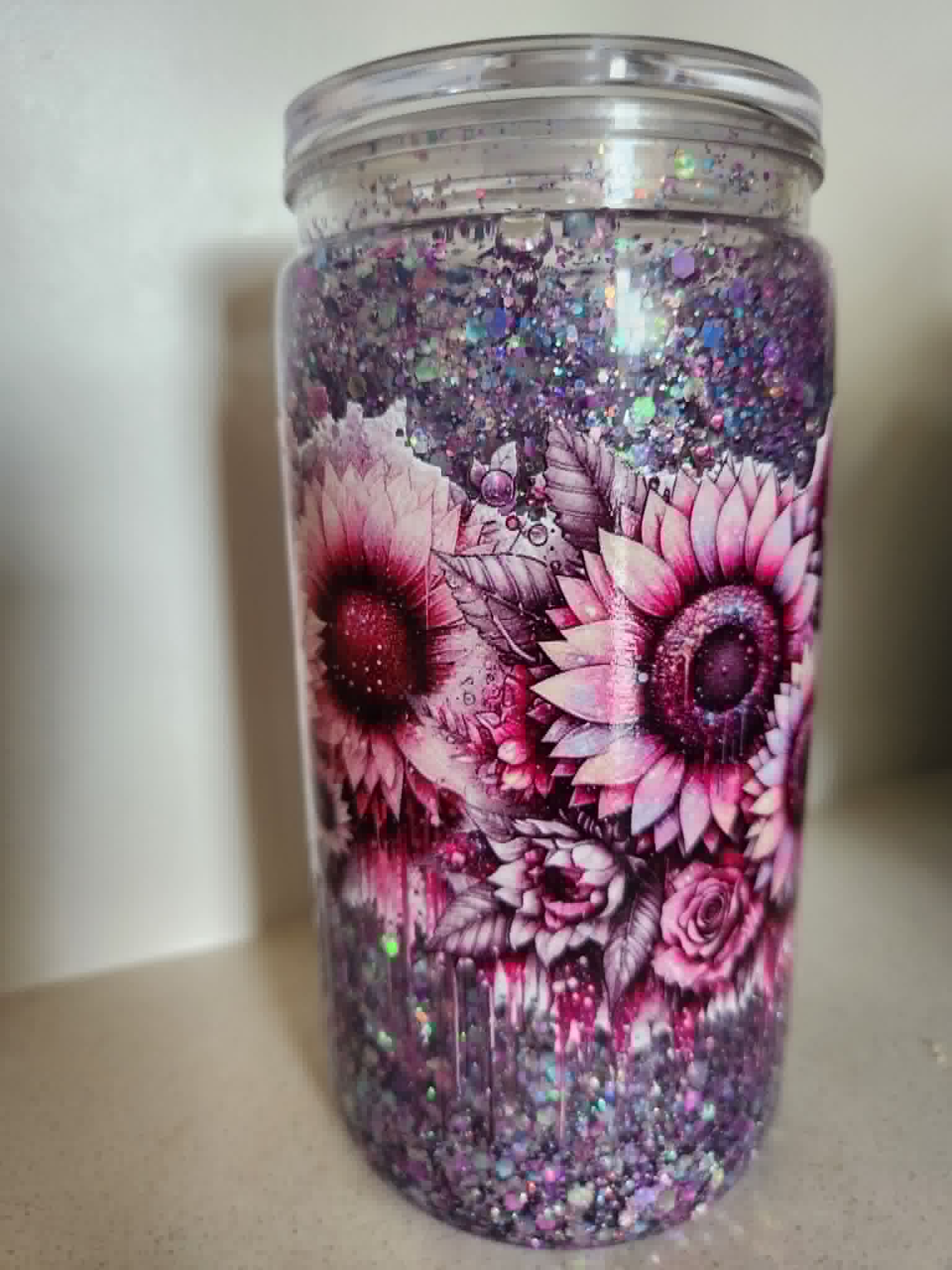 Purple Sunflower Rose snow globe acrylic Libby cup - front view showing deep pink sunflowers through chunky holographic glitter