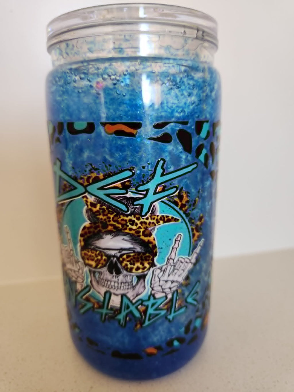 16oz Acrylic Snow Globe - Blue leopard print with skull in bandana and sunglasses design