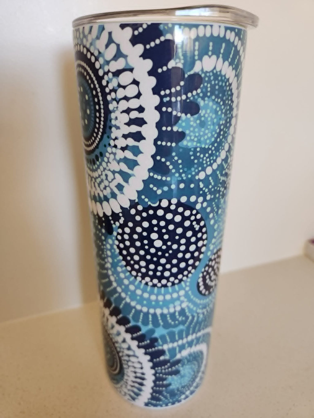 Ocean Dreaming tumbler - side view showing flowing white dot circle patterns