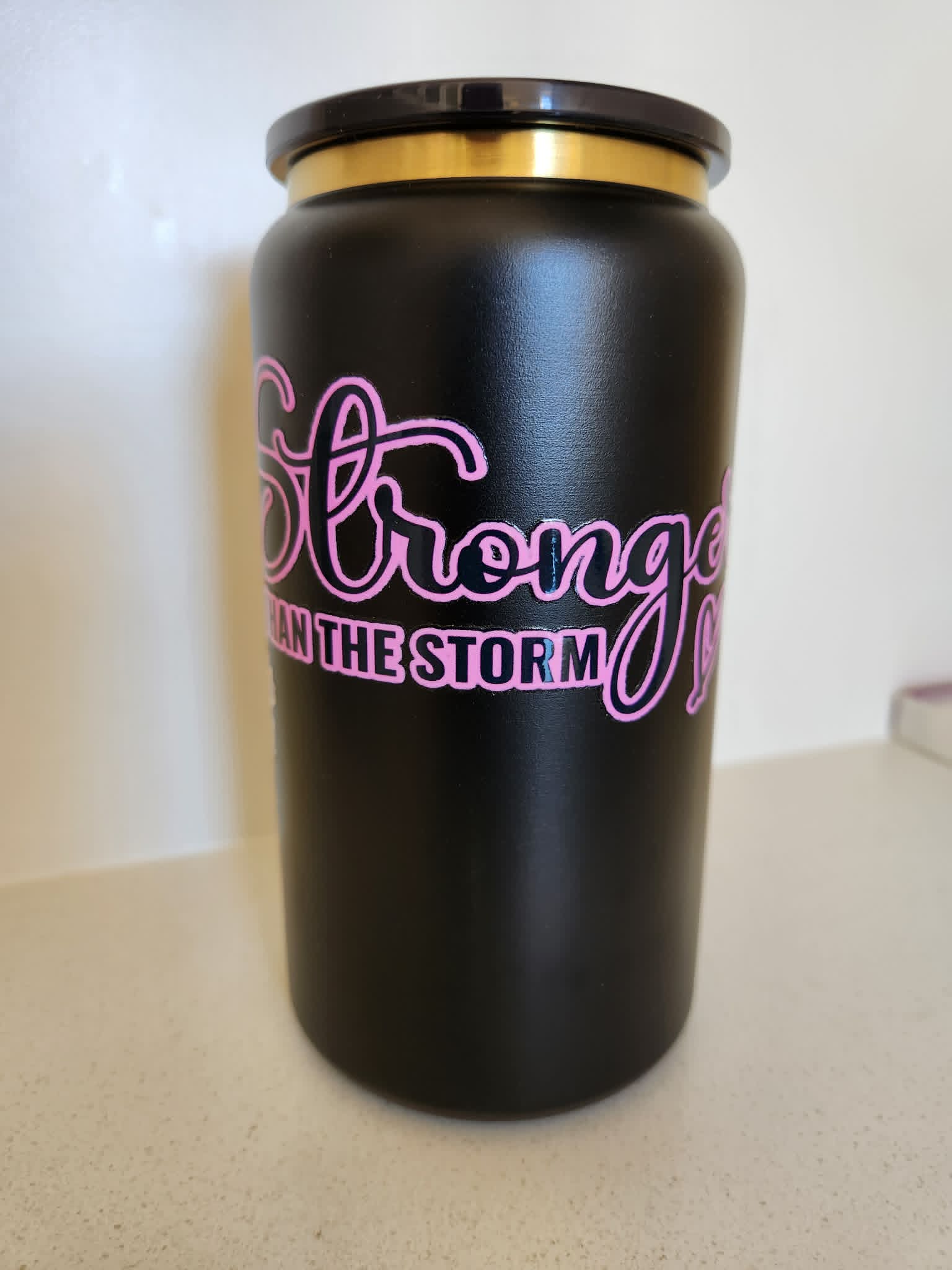16oz Stainless Libby Cup - Stronger Than The Storm pink script quote on matte black