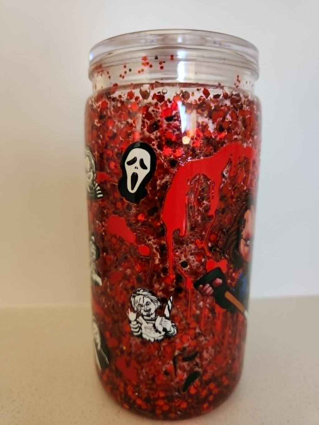 16oz Snow Globe Glass Libby Cup - Ghostface Scream and dripping blood horror icons red glitter side view
