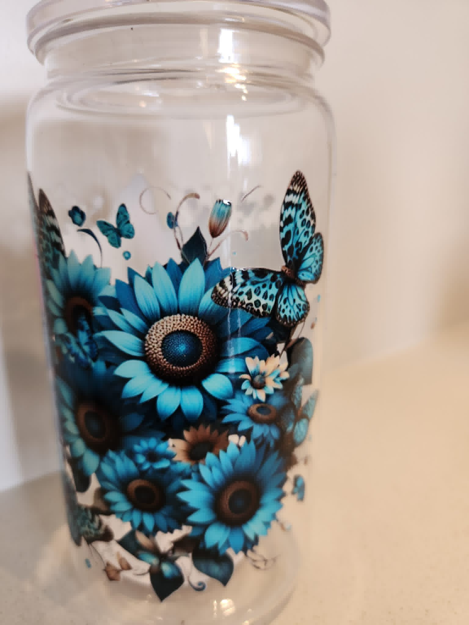 Stitch Blue Sunflower Butterfly acrylic Libby cup - back view showing full floral arrangement with butterflies