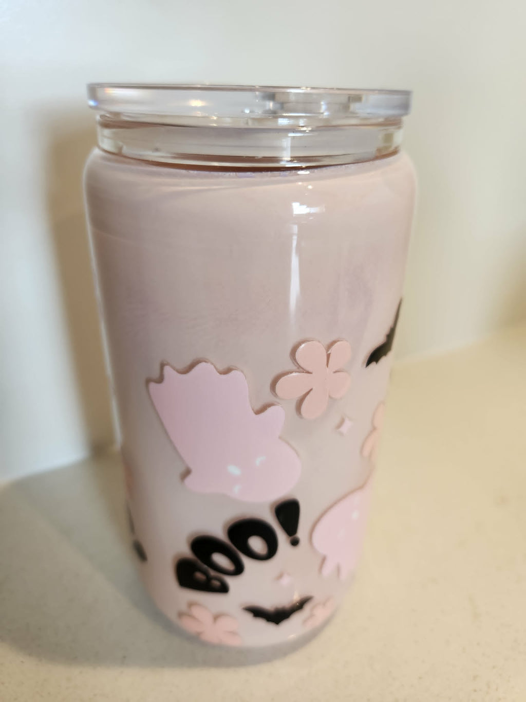 BOO Pink Ghost snow globe glass Libby cup - side view showing pink ghosts and flowers on blush background
