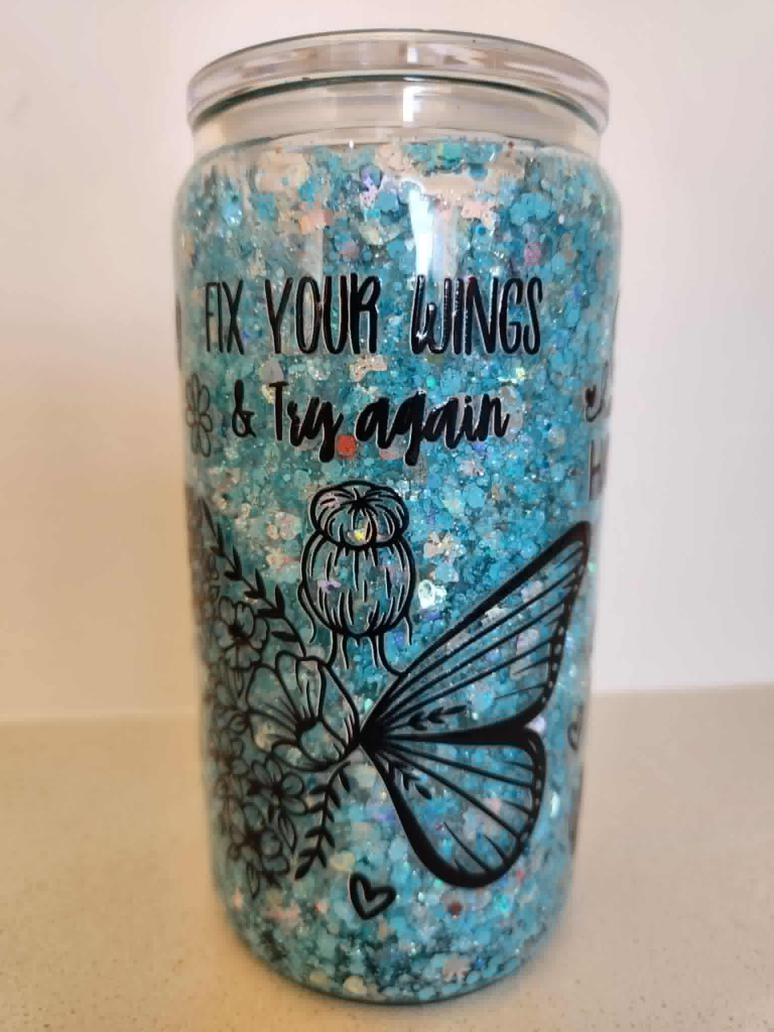 16oz Acrylic Snow Globe - Fix Your Wings and Try Again with butterfly illustration side view