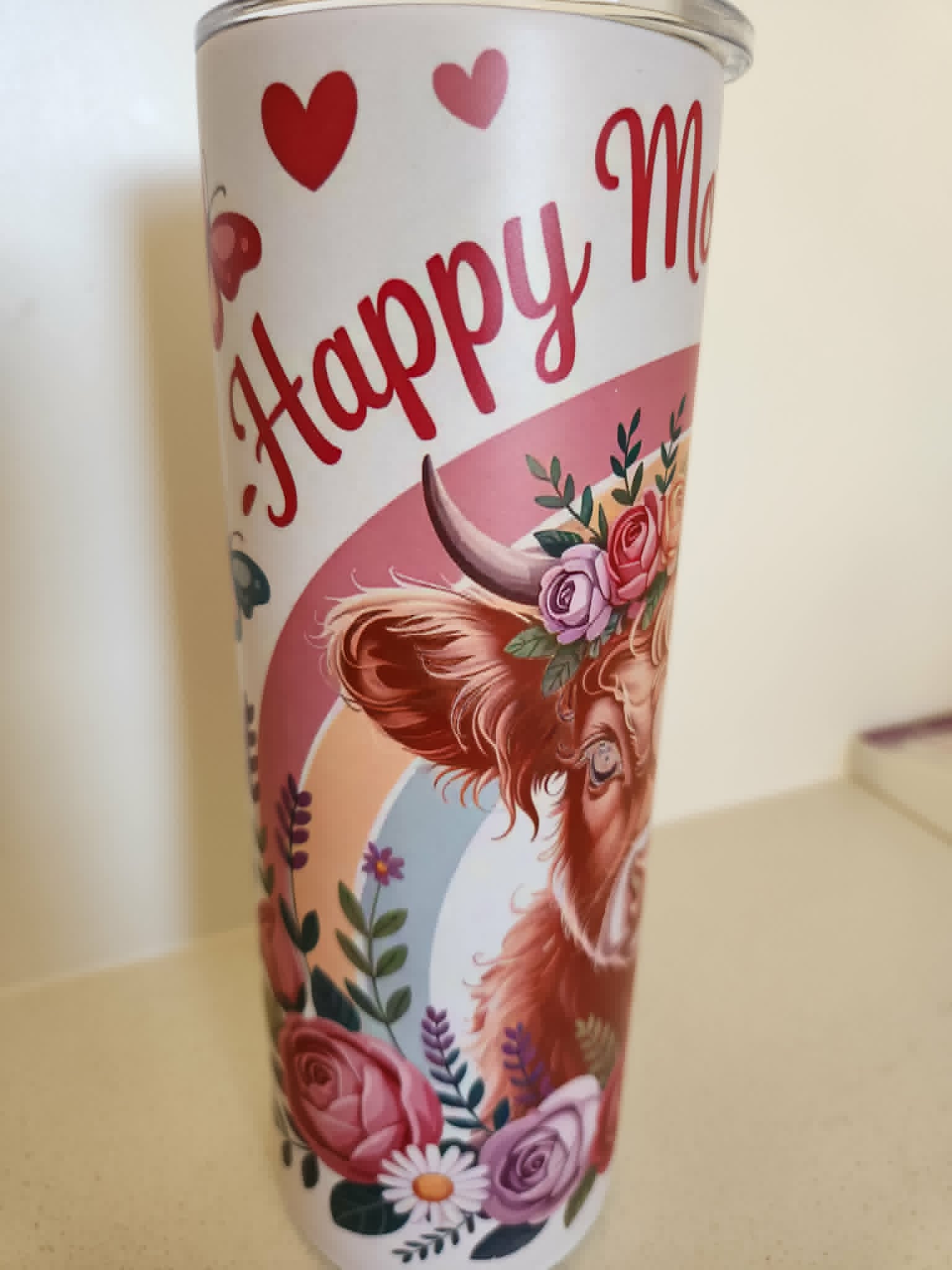 Happy Mother's Day Highland Cow glow tumbler - front view with floral crown and hearts