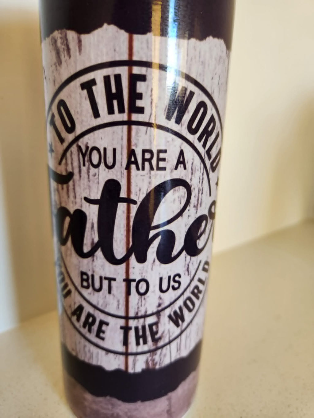 To Us You Are The World Dad tumbler - close up of Father quote on weathered wood design